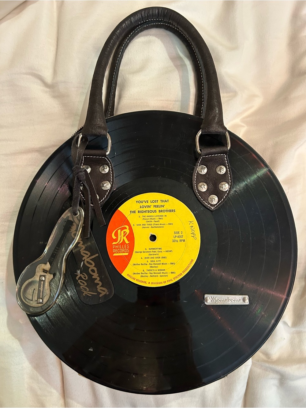 One-of-kind Momaboma circular vintage vinyl record handbag - made in Italy